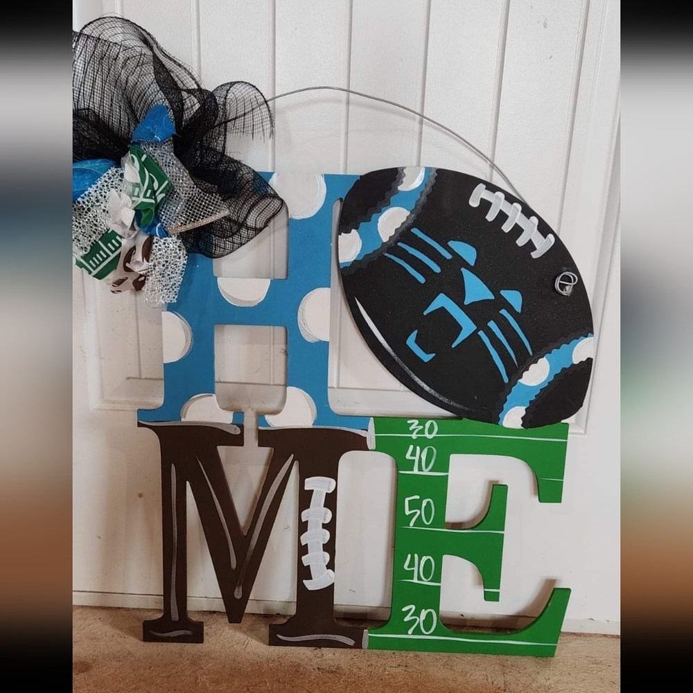 Carolina Panthers door hanger.